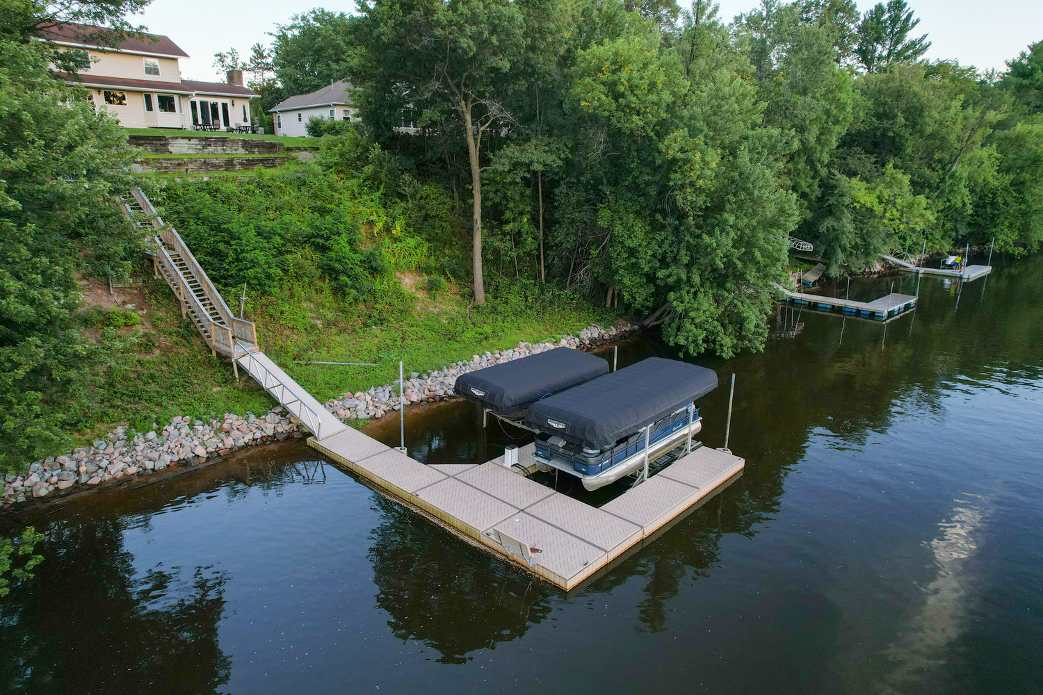 Docks and Lifts from PolyDock & Shoremaster in Sylvan Lake. Contact us about our waterfront system installation services.